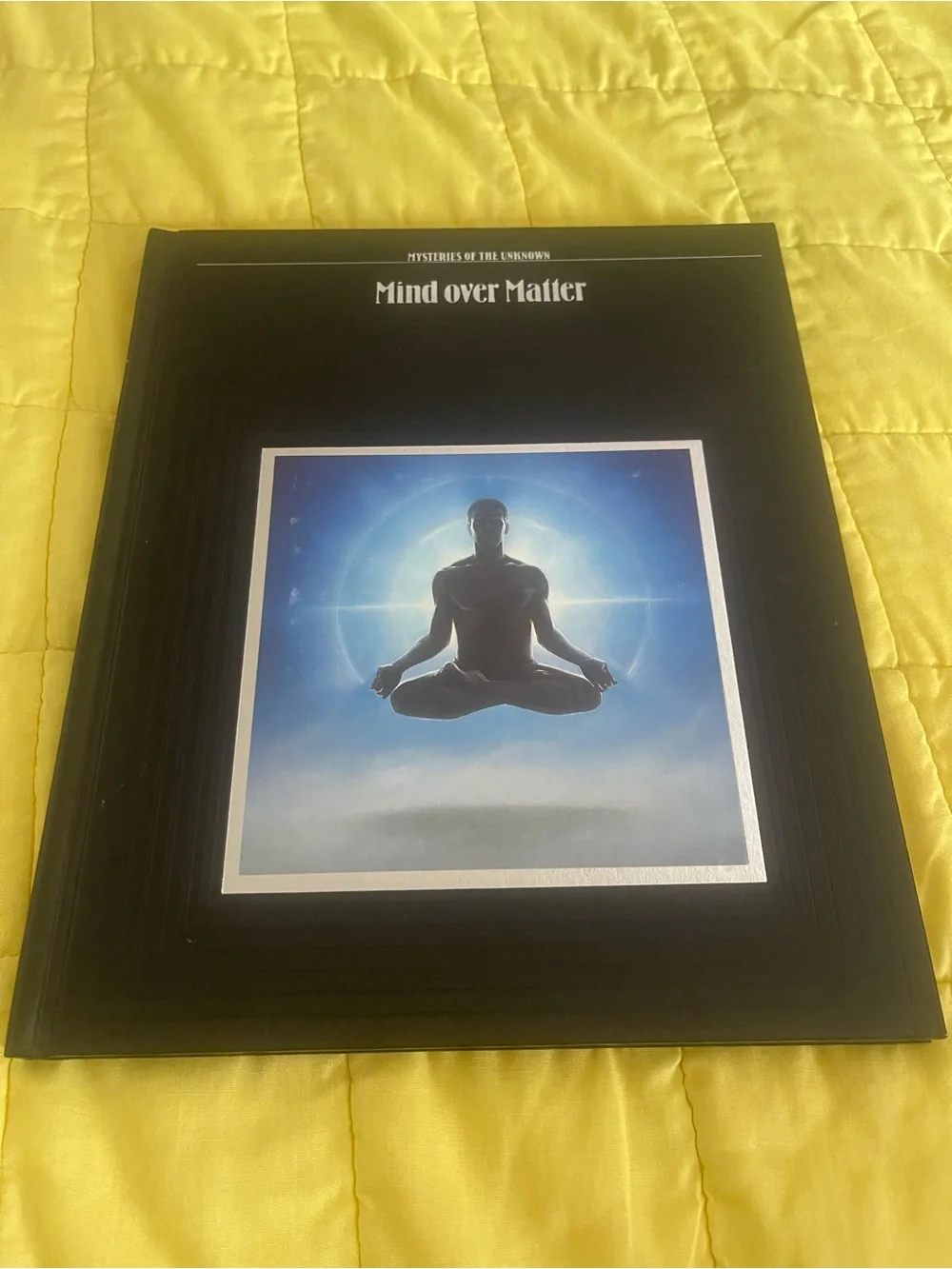 Mind Over Matter Hardcover Book - Black Cover with Blue Artwork